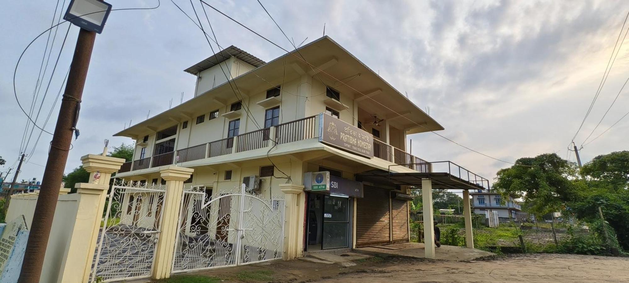 Protibha Homestay Sivasagar Bagian luar foto